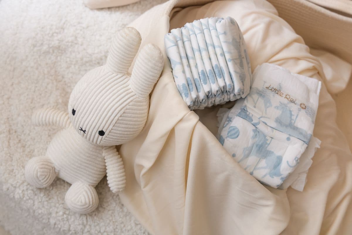 Little Rei diapers beside a knitted bunny
